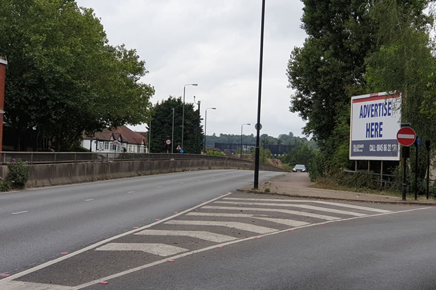The advertising hoarding on the A3