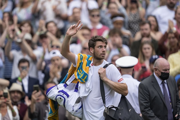 Cameron Norrie waves goodbye to the Wimbledon crowd