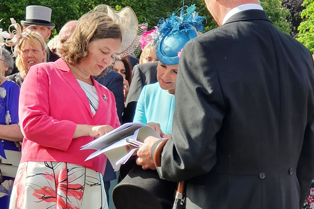 Fleur Anderson MP showing the children's work to the Countess of Wessex 
