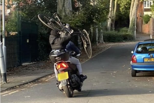 Picture posted on Twitter purporting to show robbers with stolen bike