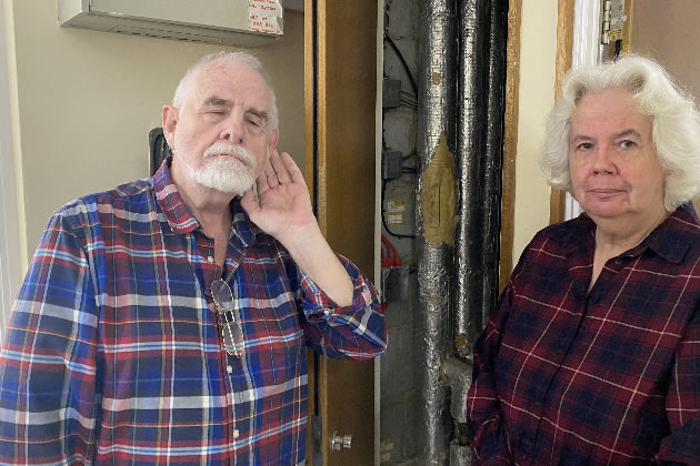 Chris Maher (left) and Maggie Jones (right) by utility cupboards where they said they have heard crickets 