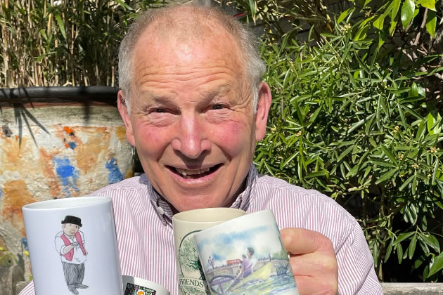 Hugh Thompson with some of his mug collection 