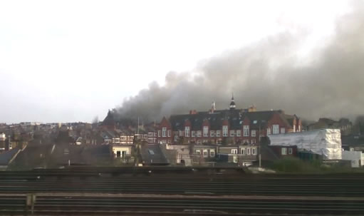 The fire as seen from a passing train 